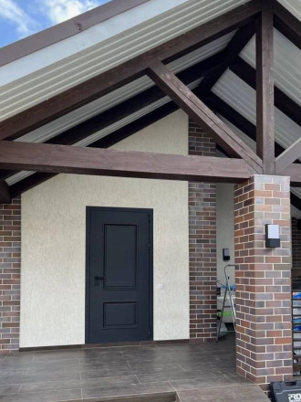 Уличная термодверь с отделкой МДФ - фото