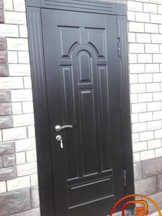 Уличная термодверь с отделкой влагостойким МДФ – фото
